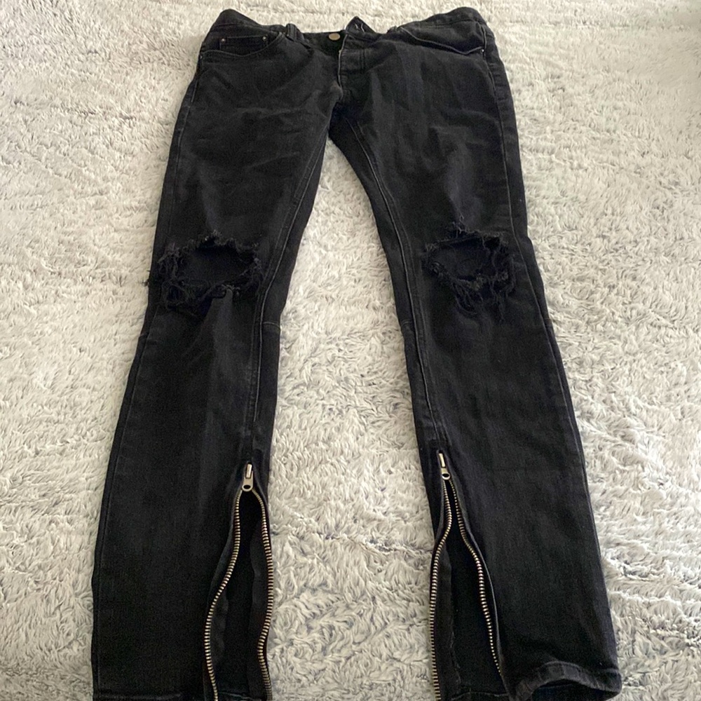 MNML black jeans with holes in knees